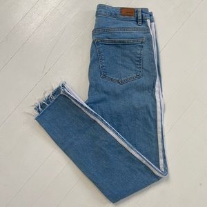subdued light wash track style jean